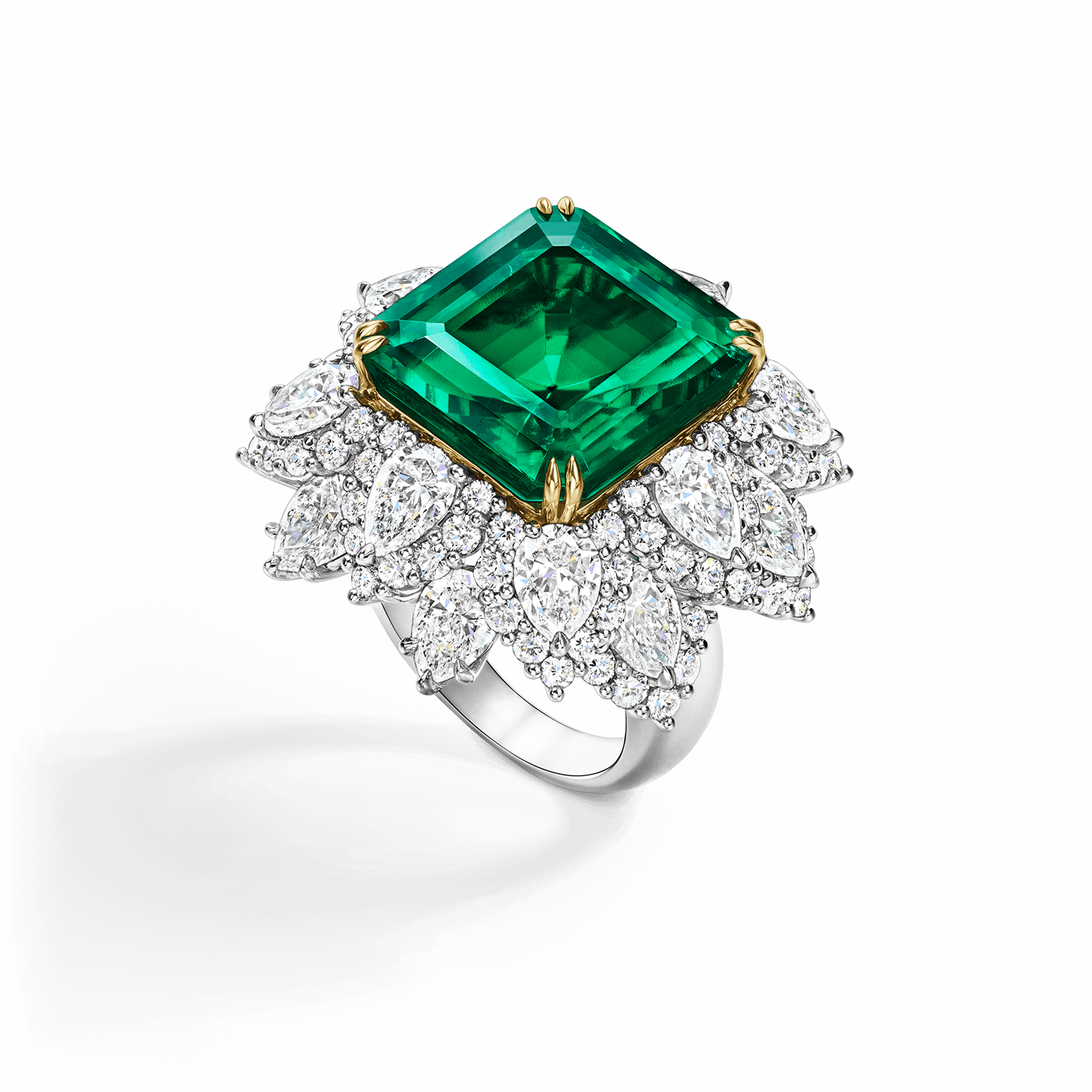 The Rockefeller-Winston ring featuring a square emerald-cut Colombian emerald center stone weighing 18.03 carats with 108 round brilliant and pear-shaped diamonds set in 18 karat yellow gold and platinum